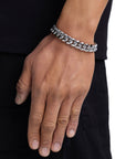 Model wearing 12mm white gold plain cuban bracelet by Iceman Society