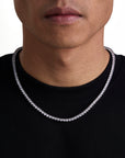 Model wearing 4mm white gold tennis necklace by Iceman Society, front view