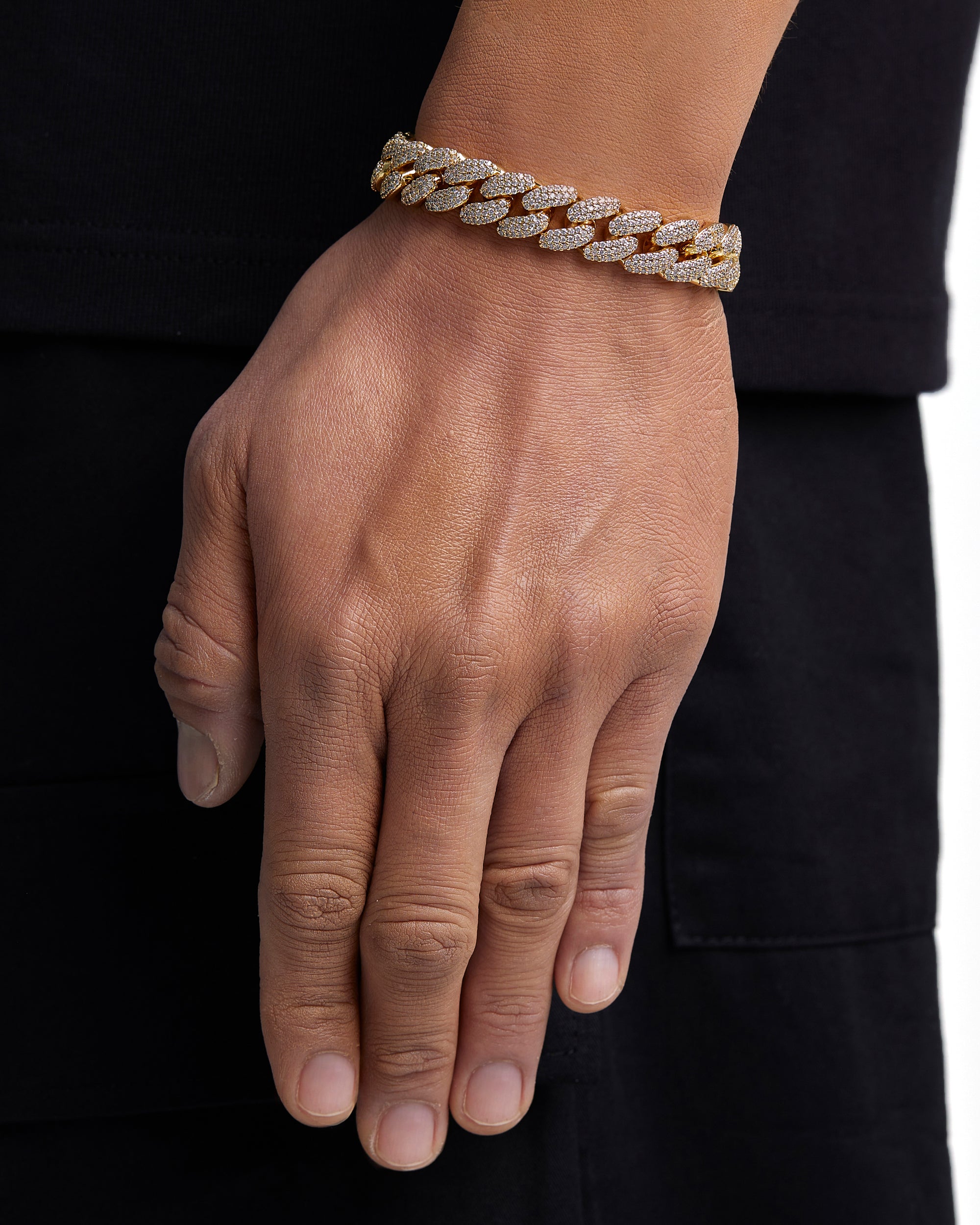 Model wearing 12mm 18k gold iceman cuban bracelet by Iceman Society
