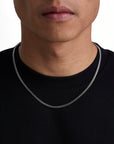 Model wearing 3mm white gold plain cuban necklace by Iceman Society