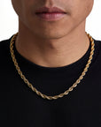 Model wearing 6mm 18k gold rope necklace by Iceman Society, front view