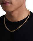 Model wearing 6mm 18k gold rope necklace by Iceman Society, side view